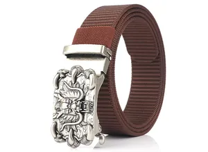Detail of nylon belt showing a brown woven texture and vintage dragon buckle
