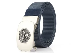 Close-up of dark blue nylon woven strap and metal automatic buckle with lion head relief