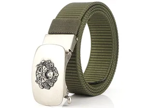 Close-up of tactical nylon belt showing silver lion head buckle and weave texture