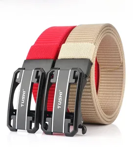 Detail of red and khaki nylon belts with black TUSHI automatic buckle and woven texture