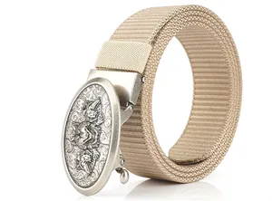 Detail of khaki nylon belt strap and silver metal buckle with embossed wolf head relief