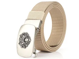 Detail of khaki nylon belt with textured weave and silver automatic lion relief buckle