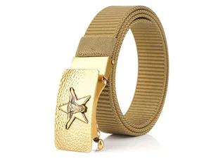 Detail of khaki nylon belt with golden hammer-textured buckle featuring an embossed star