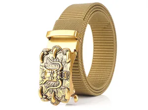 Detailed view of khaki nylon belt with golden dragon embossed alloy buckle on white surface