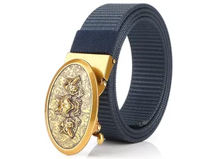 Detailed macro view of navy nylon tactical belt with a wolf head engraved gold metal buckle
