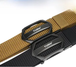 Detail of khaki and black tactical belts with thick nylon webbing and textured metal buckles
