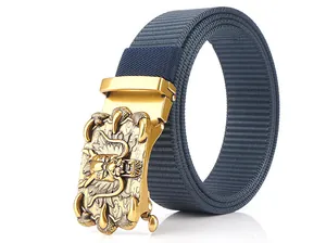 Detail of navy nylon strap and golden buckle with 3D dragon relief carving