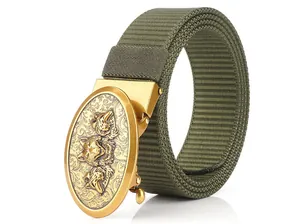 Detail of army green nylon belt with golden metal buckle featuring embossed wolf heads