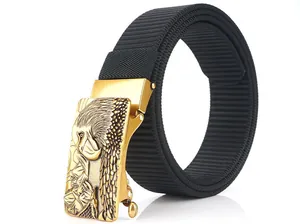 Detailed view of heavy nylon belt featuring a golden metallic eagle relief buckle