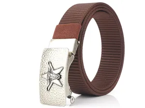 Detail of men's brown nylon belt featuring a vintage silver buckle with bull relief
