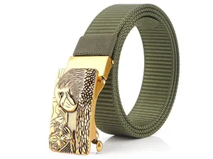 Detailed close-up of military green nylon belt with golden eagle head metal buckle