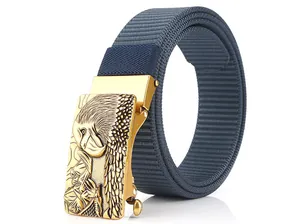 Detail of navy nylon belt featuring a gold eagle buckle with textured metal finish