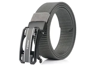 Detail of dark grey nylon belt featuring a black metal automatic buckle with hollow design