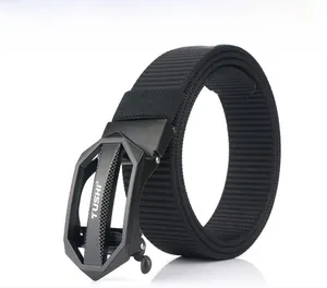 Detail of black tactical nylon belt featuring a polygon alloy buckle with brand logo