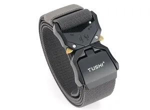 Close-up of dual quick release alloy buckle with TUSHI logo on gray tactical nylon belt