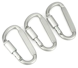 Macro detail of three D-ring carabiners with screw locking gates and brushed metal finish