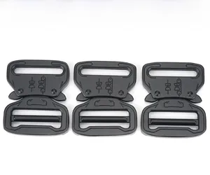 Detailed view of three matte black 39mm zinc alloy tactical quick release metal buckles