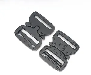 Detail of 39mm black zinc alloy cobra buckle showing both closed and released states