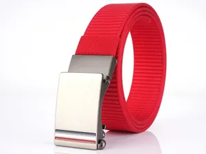 Macro shot of red nylon woven belt with brushed zinc alloy automatic buckle detail
