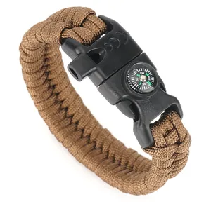 Detail of paracord survival bracelet with integrated compass and safety buckle