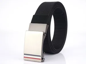 Detail of black nylon belt with matte gun-metal automatic buckle and tri-color stripe accent