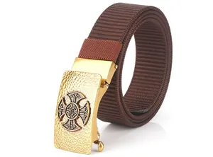Detail of nylon woven belt with a gold celtic cross hammered metal buckle