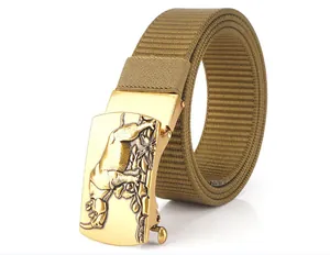 Close-up of tactical nylon belt with golden rhinoceros relief buckle in khaki color