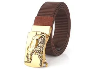 Detailed close-up of golden metal buckle with embossed rhino on nylon outdoor belt