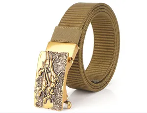 Close-up of golden metal alloy automatic buckle with 3D dinosaur relief and nylon web belt