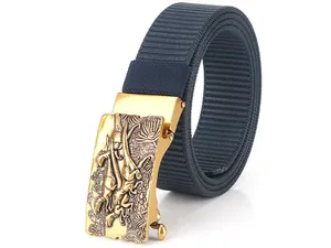 Macro shot of navy nylon belt with golden alloy automatic buckle featuring dinosaur relief