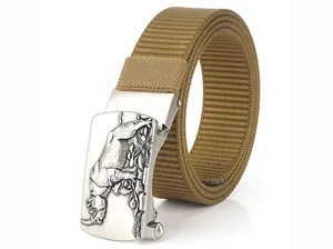 Close-up of khaki nylon belt showing silver buckle with rhinoceros relief and floral patterns