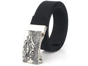 Detail of automatic metal buckle with dinosaur relief on black nylon tactical belt