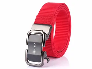 Close-up of a red woven nylon belt with a textured dark gray matte metal buckle