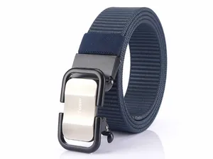 Detail of navy nylon woven belt with silver brushed metal automatic buckle and logo
