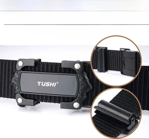 Detail of black nylon tactical belt with matte black automatic lion head buckle