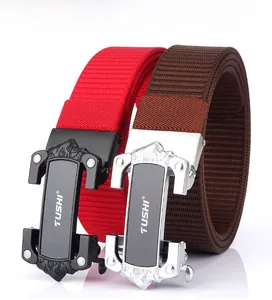 Detail of red and brown thick nylon belts with embossed mountain metal automatic buckles