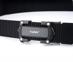 Detail of black nylon tactical belt with a zinc alloy quick-release buckle and TUSHI logo
