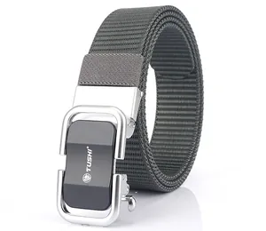 Close-up of a nylon tactical belt with a silver and black automatic metal buckle