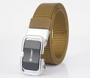 Detail of tan tactical nylon web belt featuring a matte grey metal automatic buckle