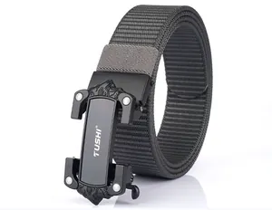 Detail of grey nylon tactical belt with a black metal quick-release buckle and TUSHI logo