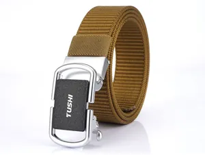 Detail of 3.5cm brown nylon belt featuring a silver automatic buckle with matte black inlay