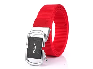 Detail of red nylon belt with silver automatic buckle and TUSHI brand logo engraving