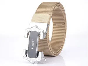 Detail of tan tactical nylon belt with silver automatic metal buckle and TUSHI logo