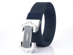 Detail of navy blue nylon woven belt featuring a textured strap and silver metal buckle