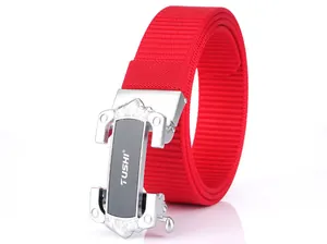 Detail of red nylon woven belt with textured silver automatic buckle and black panel