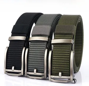 Detailed view of durable nylon belts in black, grey, and green with matte metal buckles