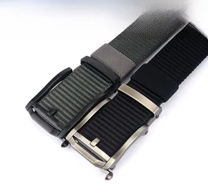 Macro detail of men's nylon tactical belt with automatic brushed metal buckle and texture