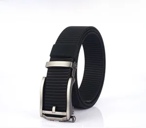Close-up of black nylon tactical belt with a gun-grey alloy automatic buckle on white background