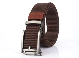 Close-up of matte dark brown nylon canvas belt with a brushed metal automatic buckle