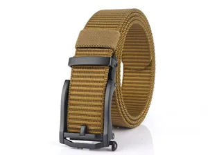 Detail of coyote brown nylon tactical belt with matte black automatic metal buckle